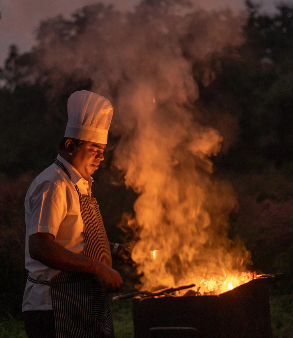 chef cooking outside meal at haldu tola