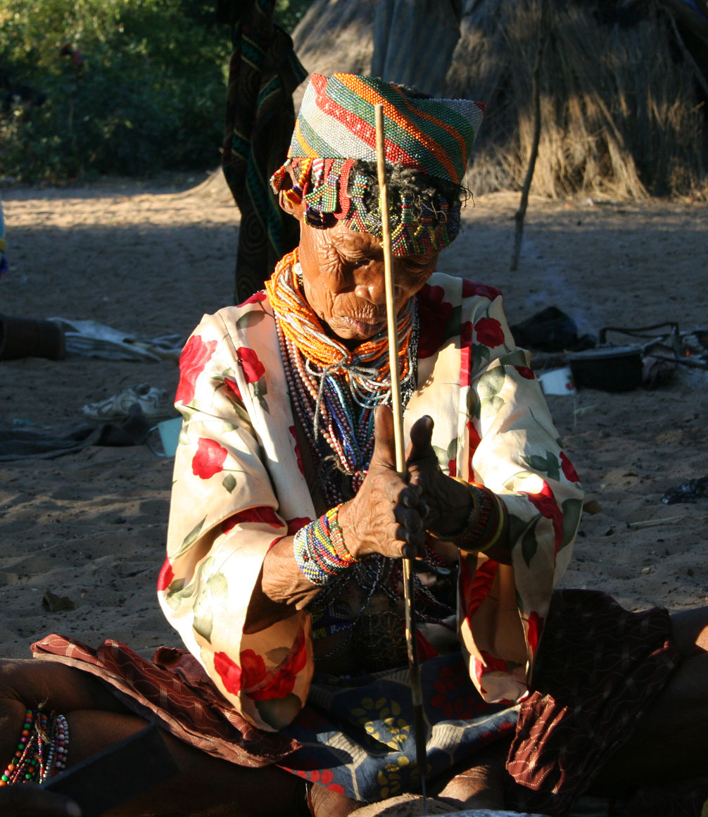 Nhoma woman demonstrating traditional tribal skills in Botswana