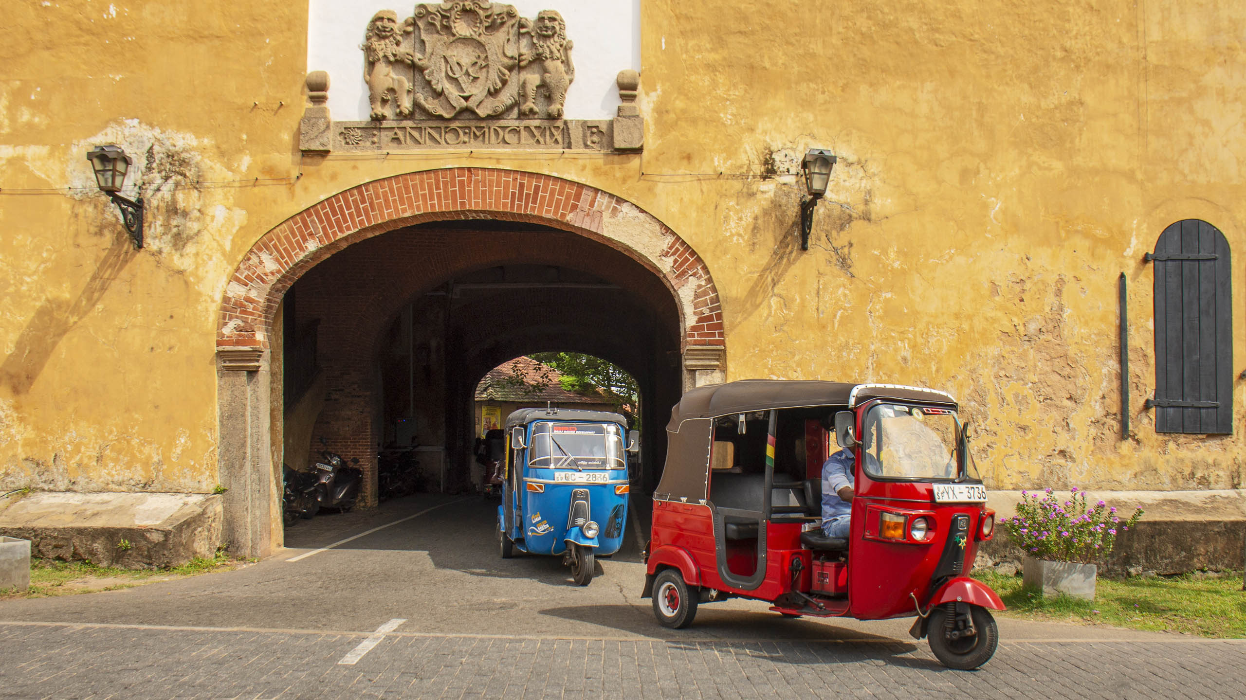 tuk tuks in street at haritha villa in sri lanka