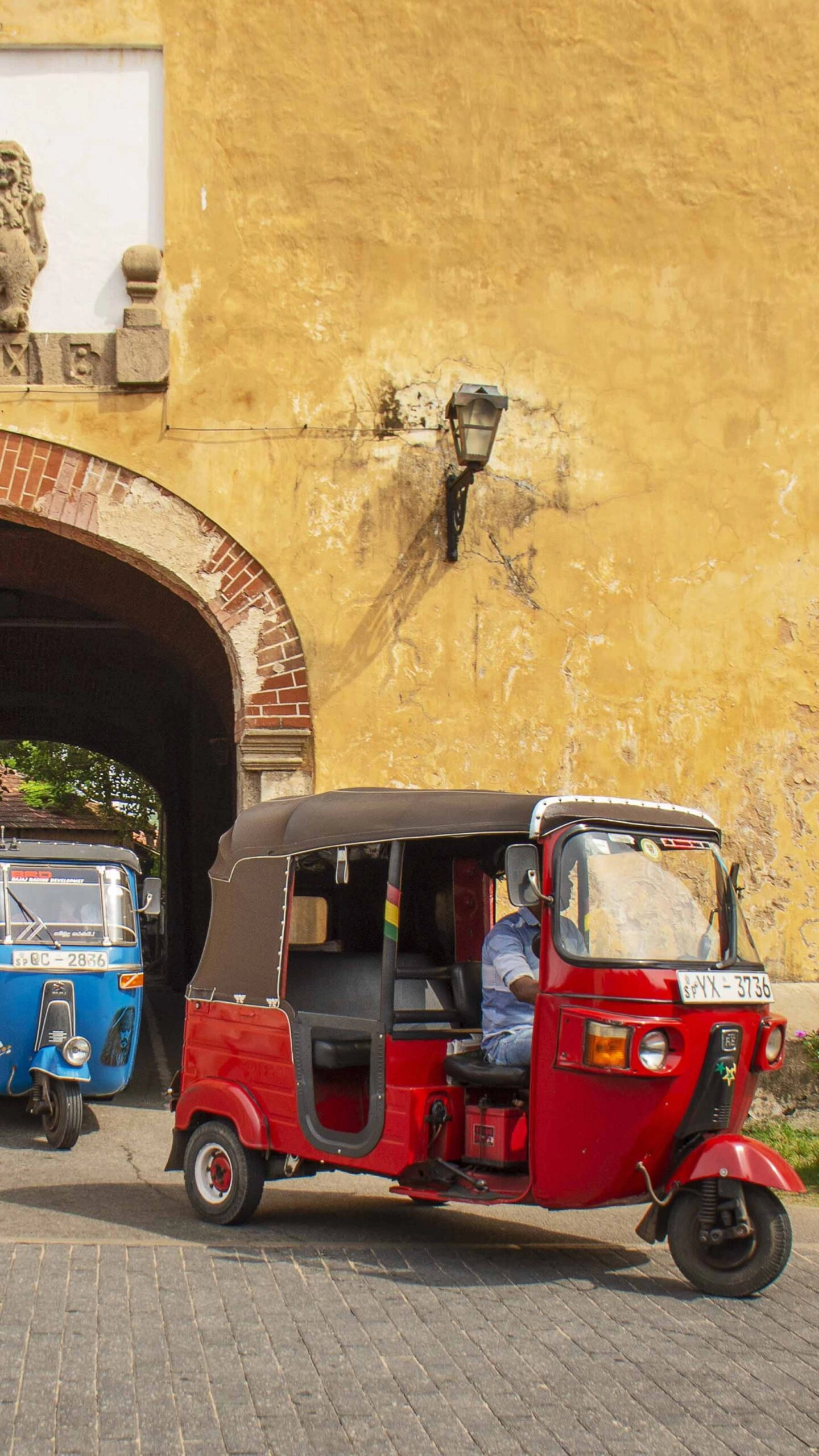 tuk tuks in street at haritha villa in sri lanka