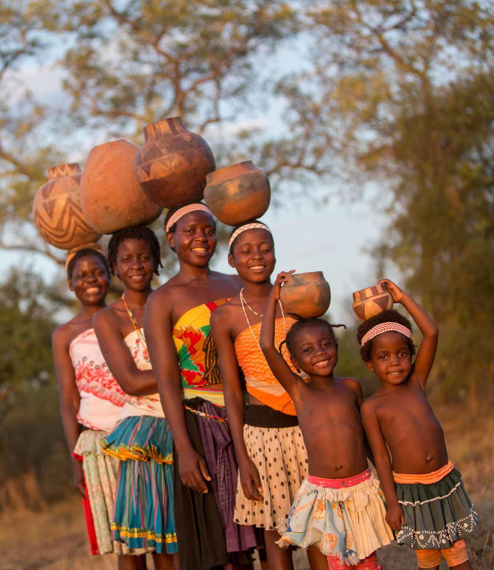 members of the local community with handicrafts