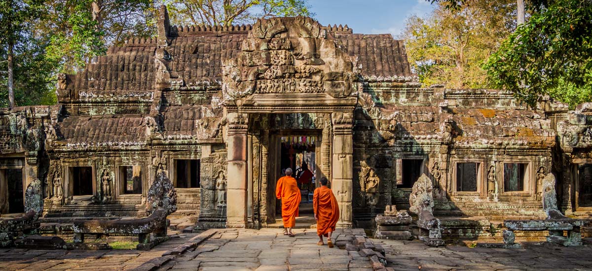 monks entering temple at angkor