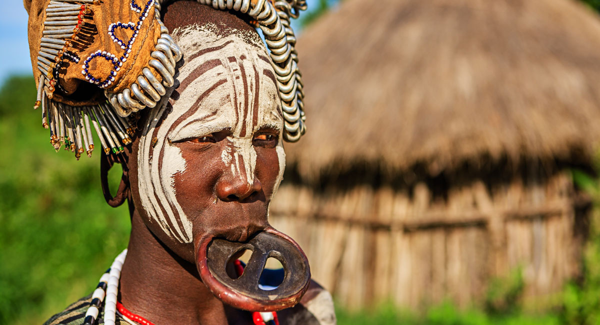 person from the mursi tribe in the omo valley, ethiopia